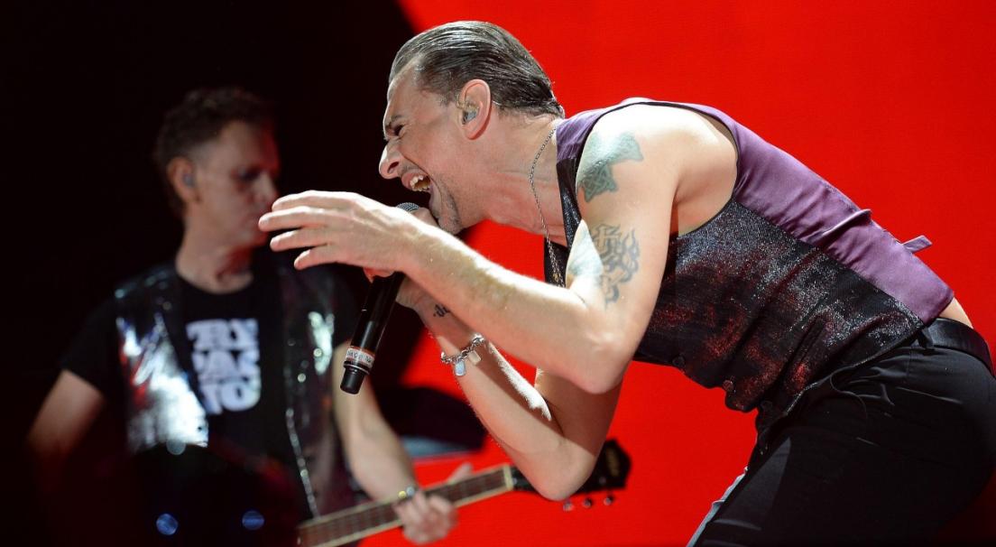Depeche Mode perform on stage during the concert in Turin