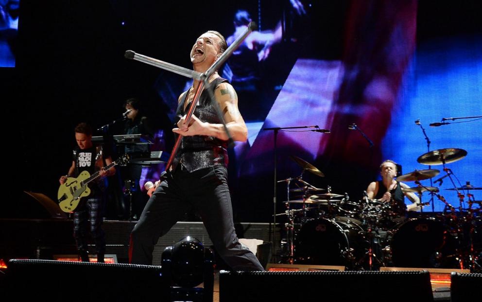Depeche Mode perform on stage during the concert in Turin